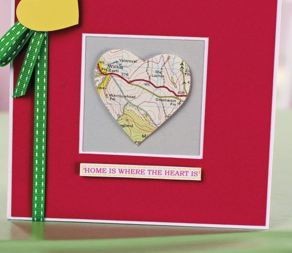 Box Frame And Greeting Heart Decorated With Maps