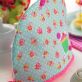 Cotton print and cross-stitch tea cosy