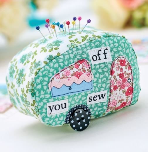 25 Colorful Scrap Fabric Projects to Gift featured by top US sewing blog, Flamingo Toes: Stitched Caravan Pincushion Project