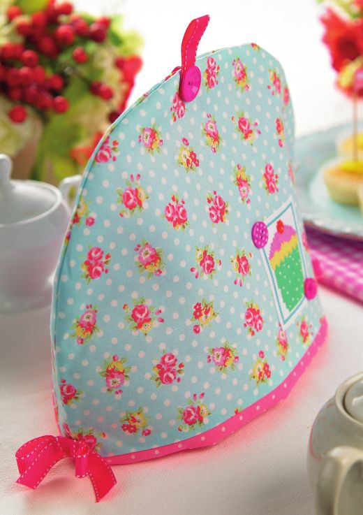 Cotton print and cross-stitch tea cosy